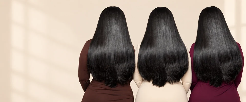 Three campaign models presenting Imani styling with long straight black hair viewed from behind.