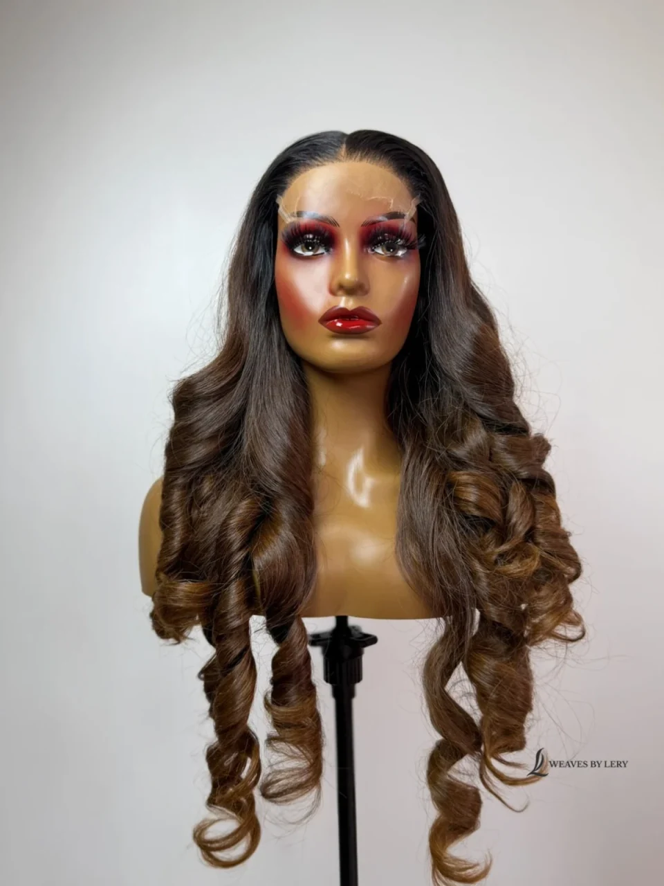 Adesuwa long curled hair on a mannequin, original product photograph