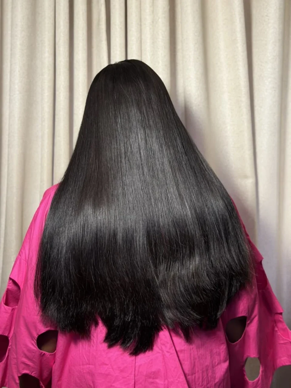 Imani straight black hair shown from the back, original product photograph
