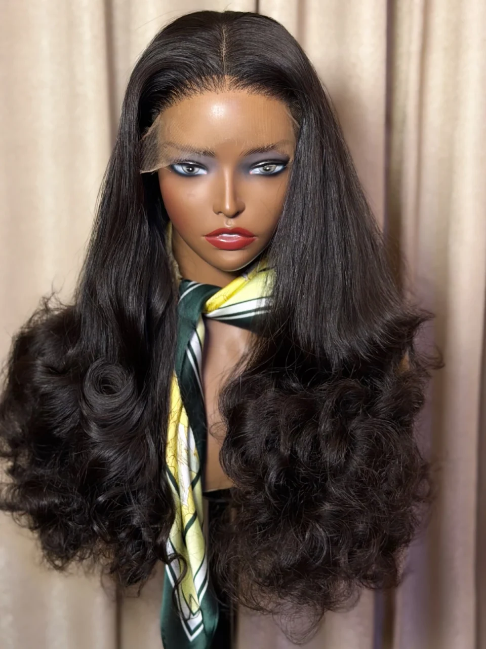 Lery Luxe black hair with curled lower lengths on a mannequin, original product photograph
