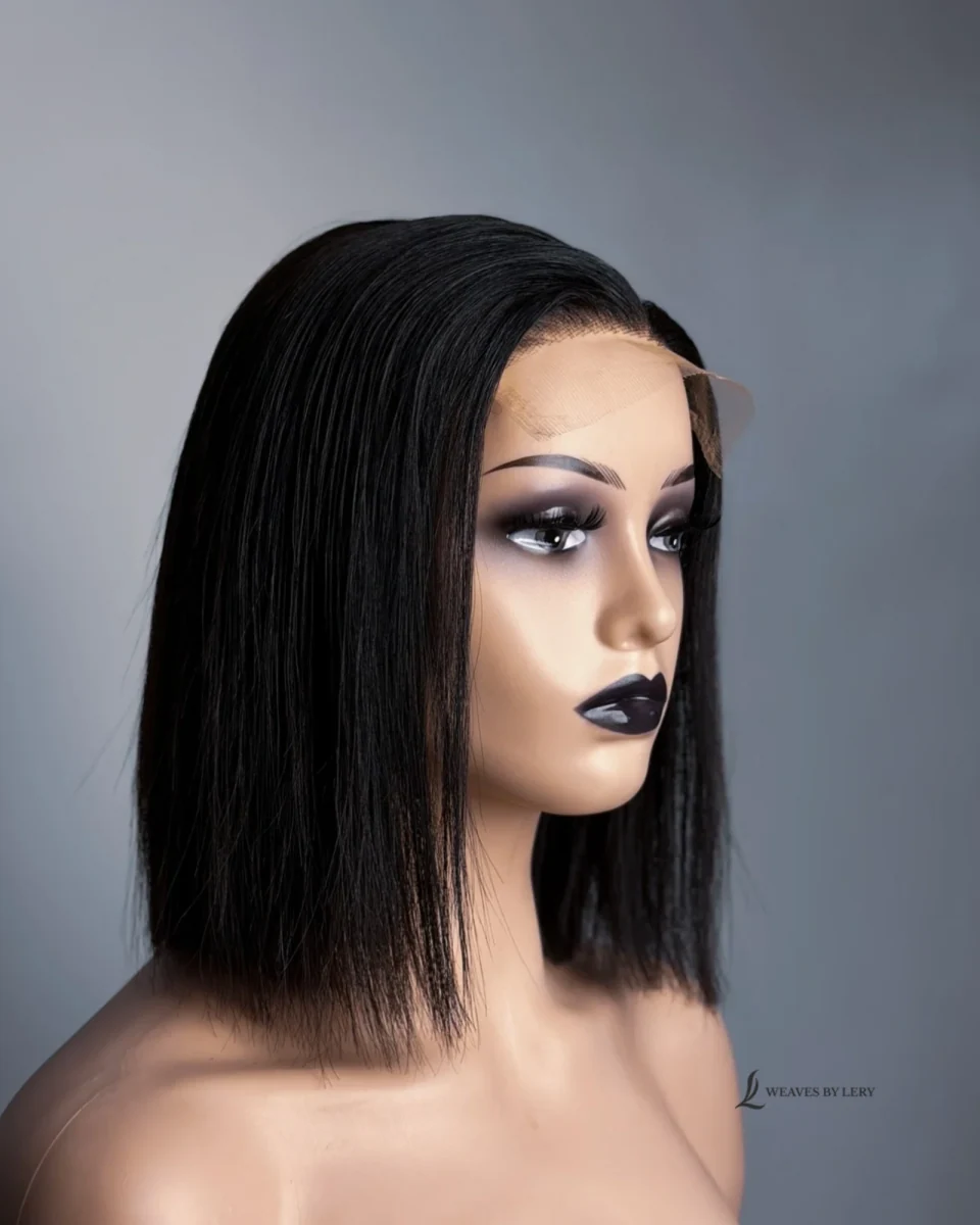 Omalicha Royale side-parted black bob on a mannequin, original product photograph