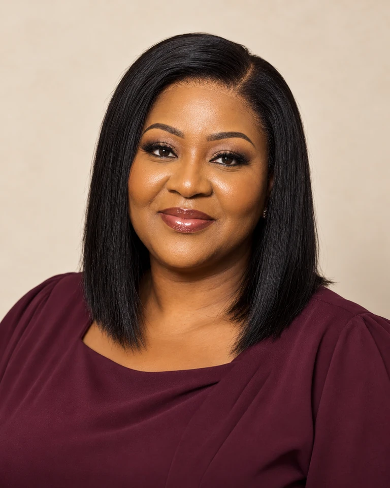 Campaign portrait of a woman wearing a black side-part bob and a plum blouse.
